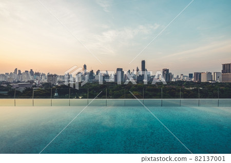 Cityscape and high-rise buildings in metropolis city with water reflection 82137001