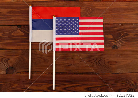 USA flag on the background of the flag of Russia. USA vs Russia. Meeting between the presidents of the United States and Russia. Tensions in relations between the countries are growing USA flag on the background of the flag of Russia. USA vs Russia. Meeting between the presidents of the United States and Russia. Tensions in relations between the countries are growing 82137322