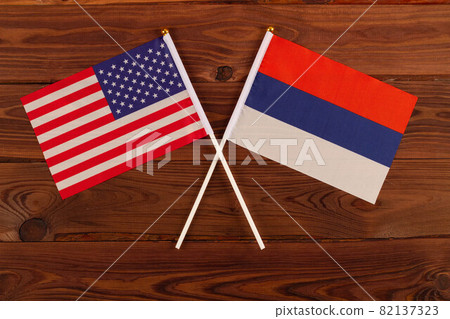 USA flag and Russia flag crossed with each other. USA vs Russia. Meeting between the presidents of the United States and Russia. Tensions in relations between the countries are growing 82137323