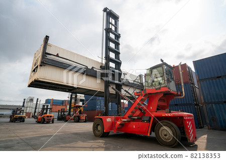 Cargo container for overseas shipping in shipyard with heavy machine . 82138353