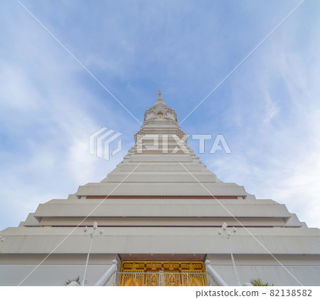 The white pagoda in Wat Paknam Phasi Charoen Temple in Phasi Charoen district at noon, Bangkok urban city town, Thailand. Tourist attraction landmark. The white pagoda in Wat Paknam Phasi Charoen Temple in Phasi Charoen district at noon, Bangkok urban city town, Thailand. Tourist attraction landmark. 82138582