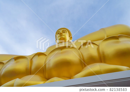 The Giant Golden Buddha in Wat Paknam Phasi Charoen Temple in Phasi Charoen district at noon, Bangkok urban city town, Thailand. Tourist attraction landmark. The Giant Golden Buddha in Wat Paknam Phasi Charoen Temple in Phasi Charoen district at noon, Bangkok urban city town, Thailand. Tourist attraction landmark. 82138583