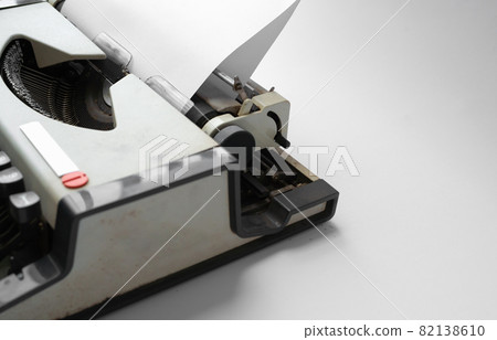 Old Thai traditional typewriter. Classic vintage antique manual typing machine isolated on white background. 19th century item. 82138610