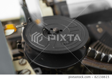 Old Thai traditional typewriter. Classic vintage antique manual typing machine isolated on white background. 19th century item. 82138615