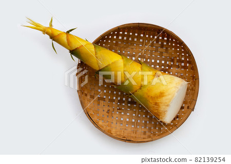 Bamboo shoot in bamboo basket on white background. 82139254