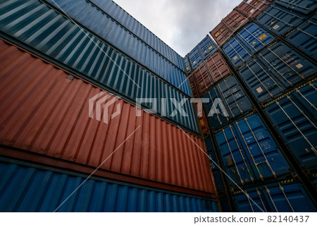 Cargo container for overseas shipping on high stack look up from ground 82140437