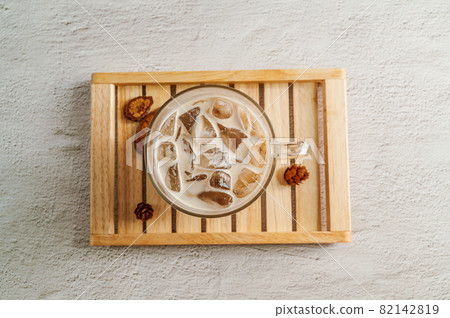 Ice cafe latte coffee in a transparent glass Ice cafe latte coffee in a transparent glass 82142819