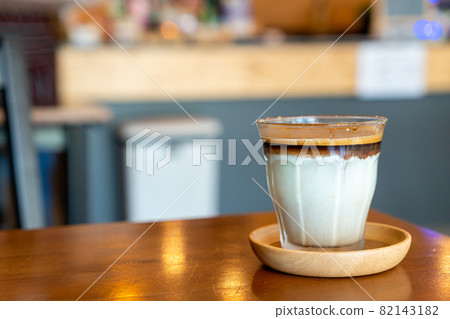 Dirty Coffee - A glass of espresso shot mixed with cold fresh milk 82143182