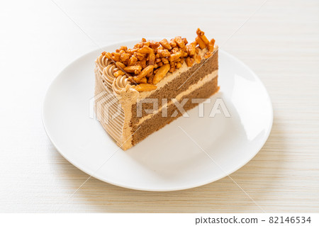 coffee almonds cake on plate 82146534