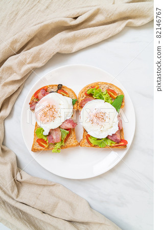 whole wheat bread toasted with vegetable, bacon and egg whole wheat bread toasted with vegetable, bacon and egg 82146767