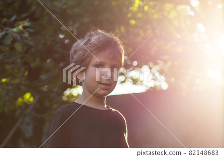 Little boy in garden Little boy in garden 82148683