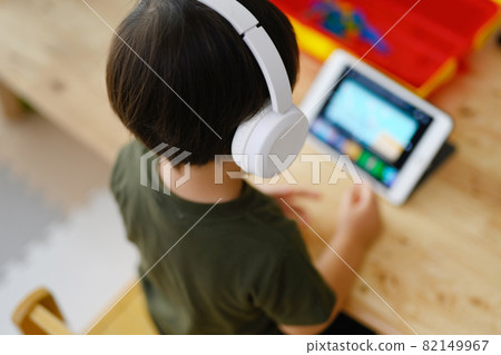 Children watching tablets Children watching tablets 82149967