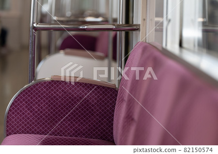 Inside and seats of an empty railroad 82150574