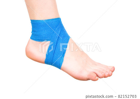 Blue elastic ankle bandage, white background, isolate. The concept of fixing a sore joint on the leg, close-up Blue elastic ankle bandage, white background, isolate. The concept of fixing a sore joint on the leg, close-up 82152703