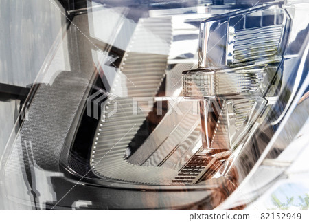 Economical and modern car headlight with LED adaptive light. Close-up, illuminate Economical and modern car headlight with LED adaptive light. Close-up, illuminate 82152949