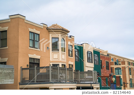 Exterior of buildings in Park City Utah with balconies against cloudy sky Exterior of buildings in Park City Utah with balconies against cloudy sky 82154640
