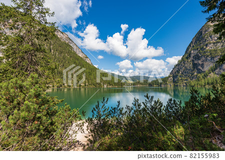 Small Alpine Lake in Trentino Italy - Pragser Wildsee or Lago di Braies Small Alpine Lake in Trentino Italy - Pragser Wildsee or Lago di Braies 82155983
