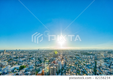 Tokyo cityscape: evening sun, blue sky and big city Tokyo cityscape: evening sun, blue sky and big city 82156234