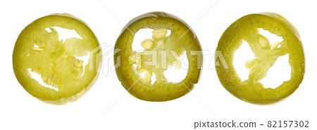 Pickled jalapeno pepper, isolated on white background. Slices of preserved hot serrano. Close up. Top view. 82157302