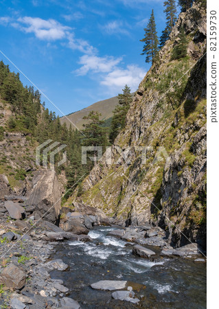Mountain river among the rocks in Tusheti, travel across Georgia. Caucasus Mountain river among the rocks in Tusheti, travel across Georgia. Caucasus 82159730