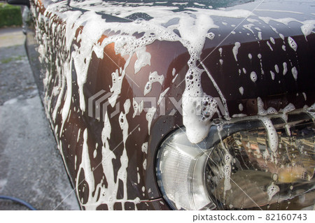 A car full of bubbles after a hand wash on a sunny day A car full of bubbles after a hand wash on a sunny day 82160743