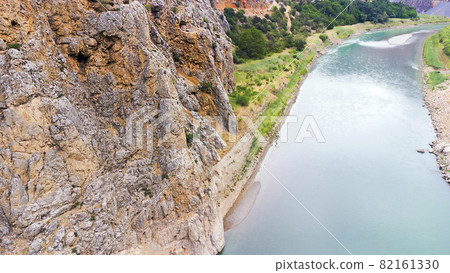 Huge steep cliffs, a canyon on the Euphrates River, Dramatic geological wonder. Beautiful background and unusual landscape, Dron Shoot 82161330