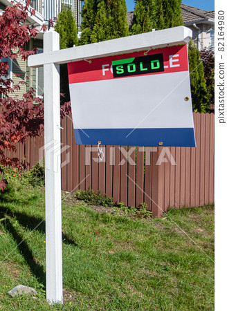 Real Estate Sold and House For Sale Sign on the Post 82164980