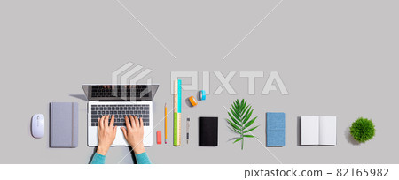 Person using a laptop computer Person using a laptop computer 82165982