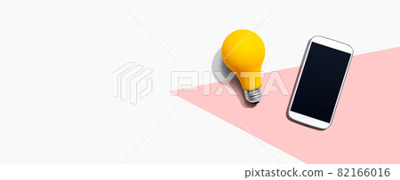 Smartphone with a yellow light bulb 82166016