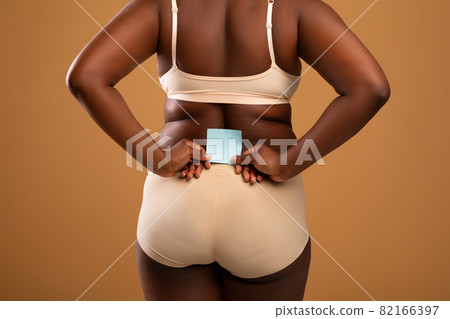 Body Positive Black Woman In Underwear Holding Paper Note Body Positive Black Woman In Underwear Holding Paper Note 82166397