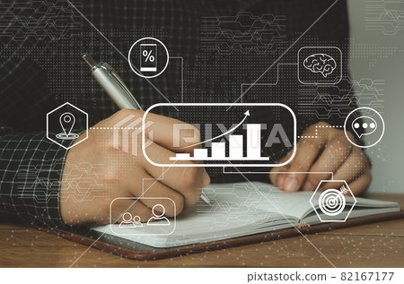 Businessman writing on notebook with icon chart growth up. Digital marketing of statistics level up of graph. business management  goal strategy and action plan. Global customer network connection. 82167177