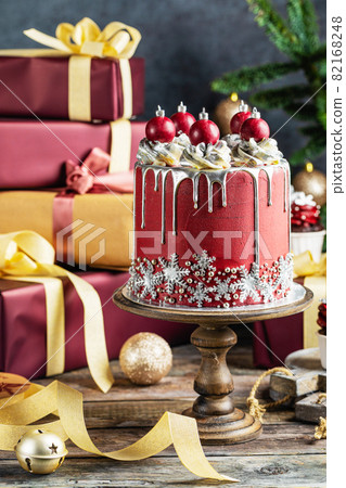 Christmas holiday cake decorated with sweet balls and snowflakes 82168248
