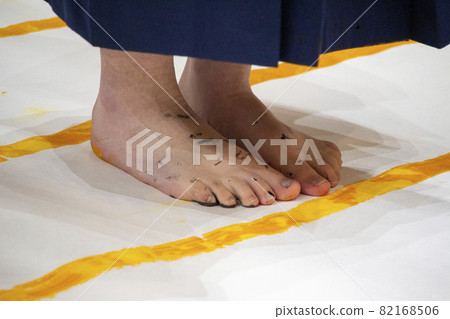 High school girl standing on a calligraphy 82168506