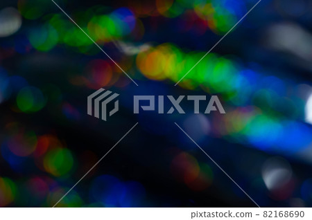 Abstract Bokeh lines on dark backdrop. Abstract Bokeh lines on dark backdrop. 82168690