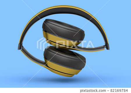 Gold gaming headphones and concept of music equipment isolated on blue . 82169784