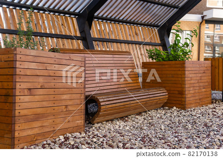 elements of landscaping in the courtyard of an apartment building 82170138