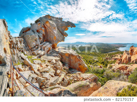 Astonishing view on Palau port from popular travel destination Bear Rock (Roccia dell Orso). 82170157