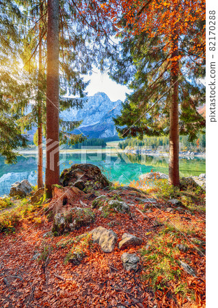 Astonishing view of Fusine lake with Mangart peak on background Astonishing view of Fusine lake with Mangart peak on background 82170288