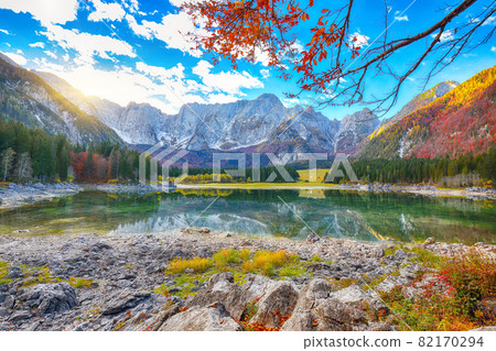 Fairytale  view of Fusine lake with Mangart peak on background 82170294