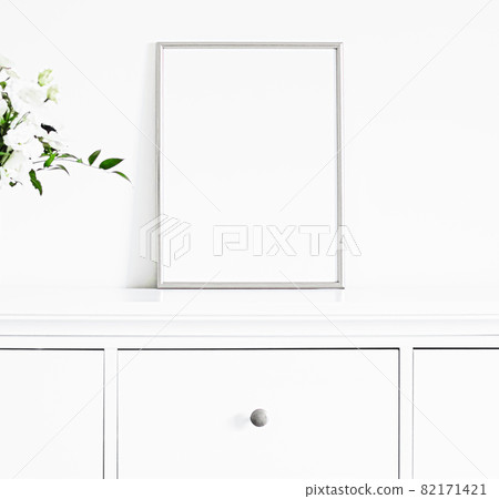 Silver frame on white furniture, luxury home decor and design for mockup, poster print and printable art, online shop showcase 82171421