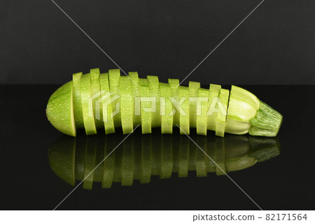 Zucchini isolated on acrylic black background. 82171564
