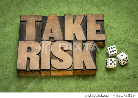 take risk word abstract in wood type 82172039