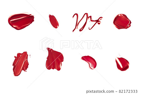 Red lipstick samples as beauty cosmetic texture isolated on white background, makeup smear or smudge as cosmetics product or paint strokes 82172333