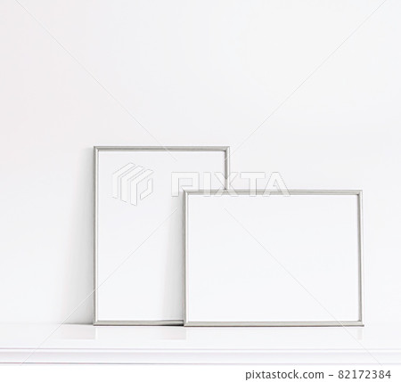 Silver frame on white furniture, luxury home decor and design for mockup, poster print and printable art, online shop showcase 82172384