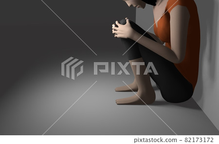 Image of a woman mourning by the wall 82173172