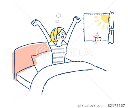 A woman who grows in the morning sun in bed 82173367