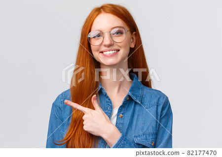 Close-up portrait cute cheerful redhead, foxy... - Stock Photo