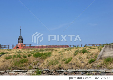 Priozersk, Russia - July 10, 2021: Tower and rampart of Korela fortress in the city of Priozersk, Leningrad region, built in XIII - XIV centuries Priozersk, Russia - July 10, 2021: Tower and rampart of Korela fortress in the city of Priozersk, Leningrad region, built in XIII - XIV centuries 82179748
