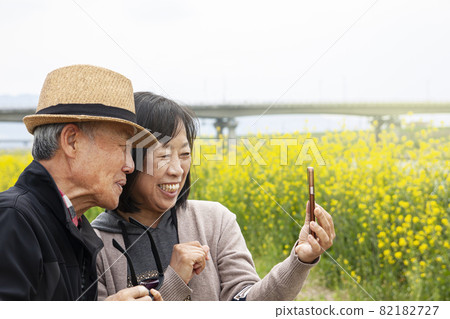 middle-aged man making a video call middle-aged man making a video call 82182727