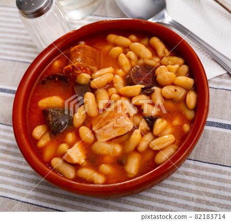 Fabada asturiana with stewed beans, pork, morcilla, chorizo in clay cazuela Fabada asturiana with stewed beans, pork, morcilla, chorizo in clay cazuela 82183714